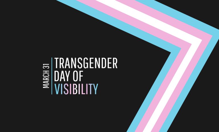 Transgender Day of Visibility with transgender pride flag and sign